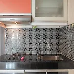 Homey And Modern Studio At Sky Terrace Apartment By Travelio