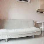 Homey And Modern Studio At Sky Terrace Apartment By Travelio